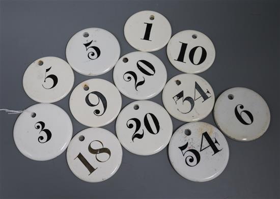 Twelve circular bin number labels, six Charles Farrow, six Farrow & Jackson